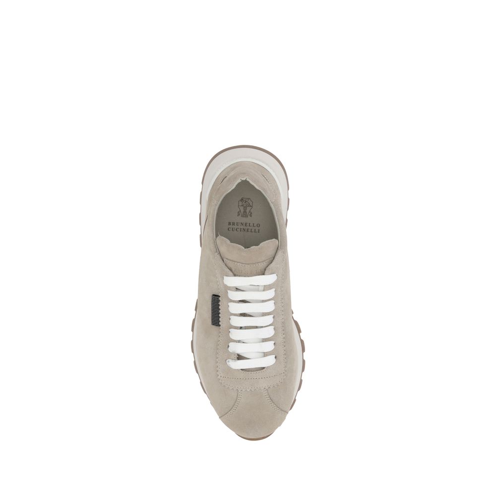 Sneakers with iconic embellishments