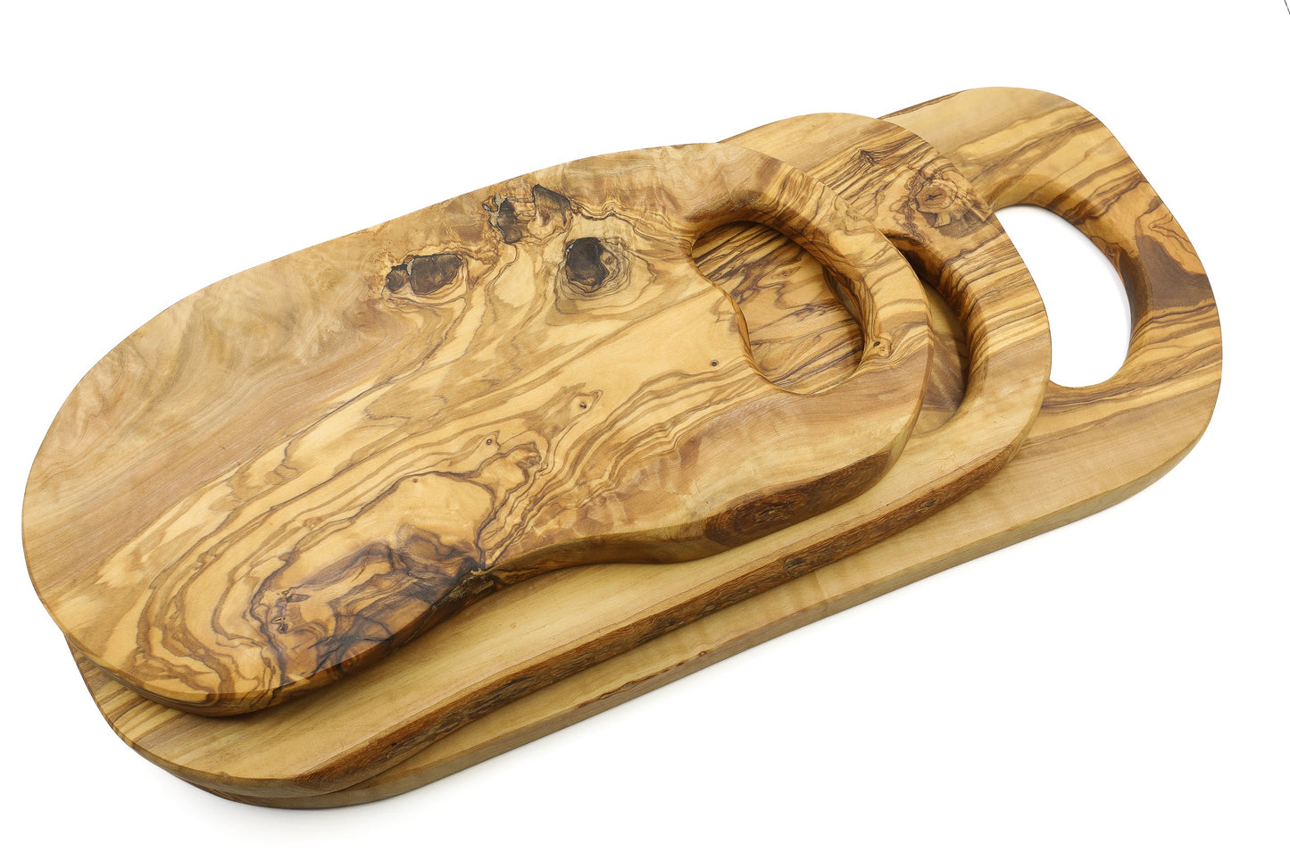 Olive wood cutting board with in-hand handle, organic shape